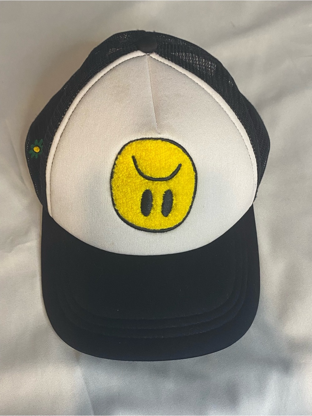 Black & White Trucker Hat with Yellow Smiley Patch